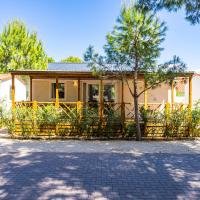 Exterior of a Standard Mobile Home among the trees